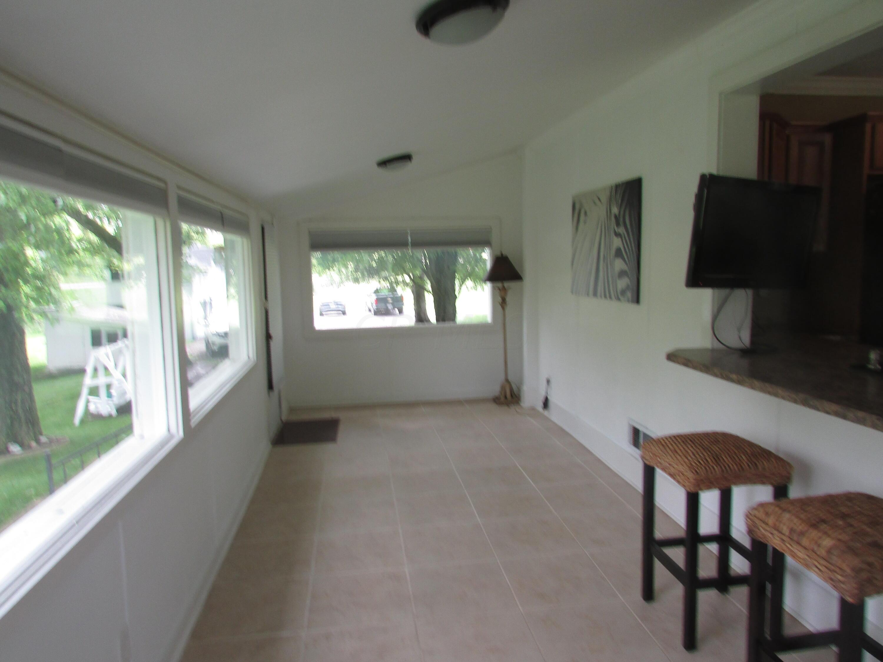 1000 Lewis Center Road Lewis Center, OH 43035 - Photo 6 of 19 Lewis Center Sun Porch open to Kitchen