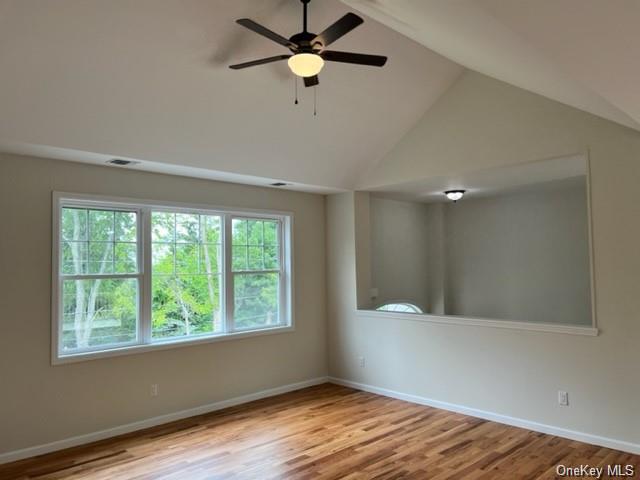 Lot 13 Silo Ridge Drive Wallkill, NY 12589 - Photo 4 of 12 Empty room with ceiling fan, light wood-type flooring, and high vaulted ceiling