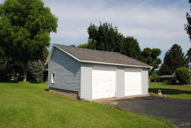 1209 Clearfield Road Nazareth, PA 18064 - Photo 20 of 22 a view of a backyard with a garden