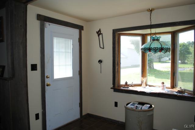 1209 Clearfield Road Nazareth, PA 18064 - Photo 6 of 22 a view of bathroom with windows and dual sinks