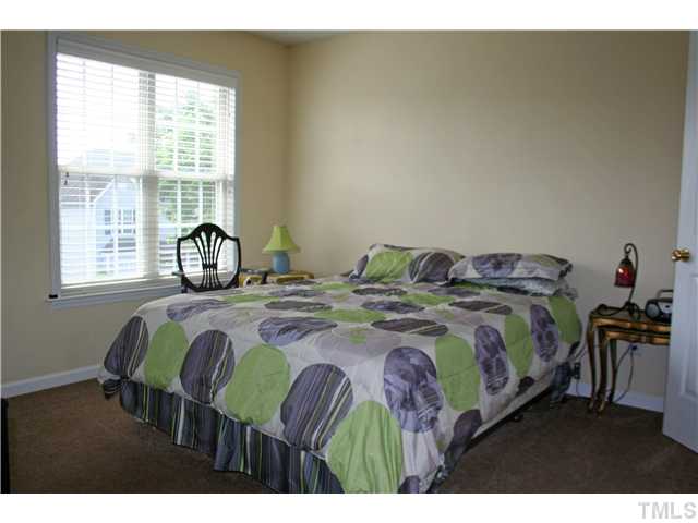 2111 Turtle Point Drive Raleigh, NC 27604 - Photo 11 of 21 The second bedroom comes complete with a great elevated view, natural light and a private bath. Could be for your children or a roommate. This bedroom also has a large closet.