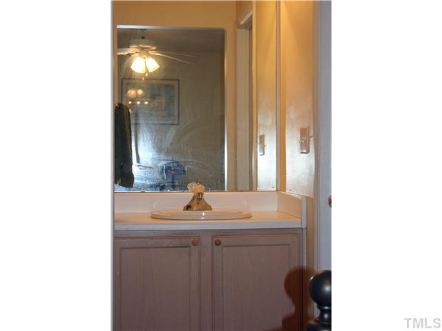2111 Turtle Point Drive Raleigh, NC 27604 - Photo 13 of 21 The Master Bath offers a separate vanity for convenience. The room also offers a walk-in closet for all of your clothes.