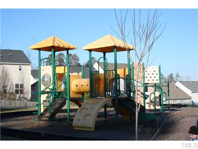 2111 Turtle Point Drive Raleigh, NC 27604 - Photo 16 of 21 Community playground for the kiddies. It is within walking distance so you can spend some quality time with your young child.