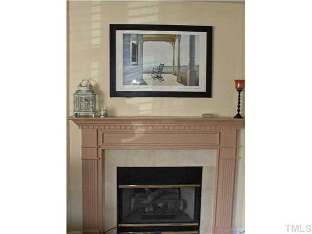 2111 Turtle Point Drive Raleigh, NC 27604 - Photo 6 of 21 The fireplace mantel is a focal point in this family room. Enjoy cozy evenings in front of the gas fireplace. No mess...no fuss...just enjoyment!