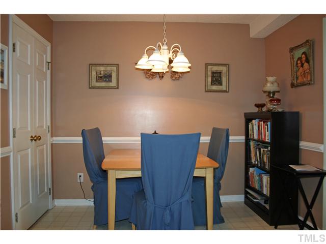2111 Turtle Point Drive Raleigh, NC 27604 - Photo 9 of 21 Build great family memories around the dining table in this cozy dining room off the kitchen. The home also has a pantry just off the dining room.