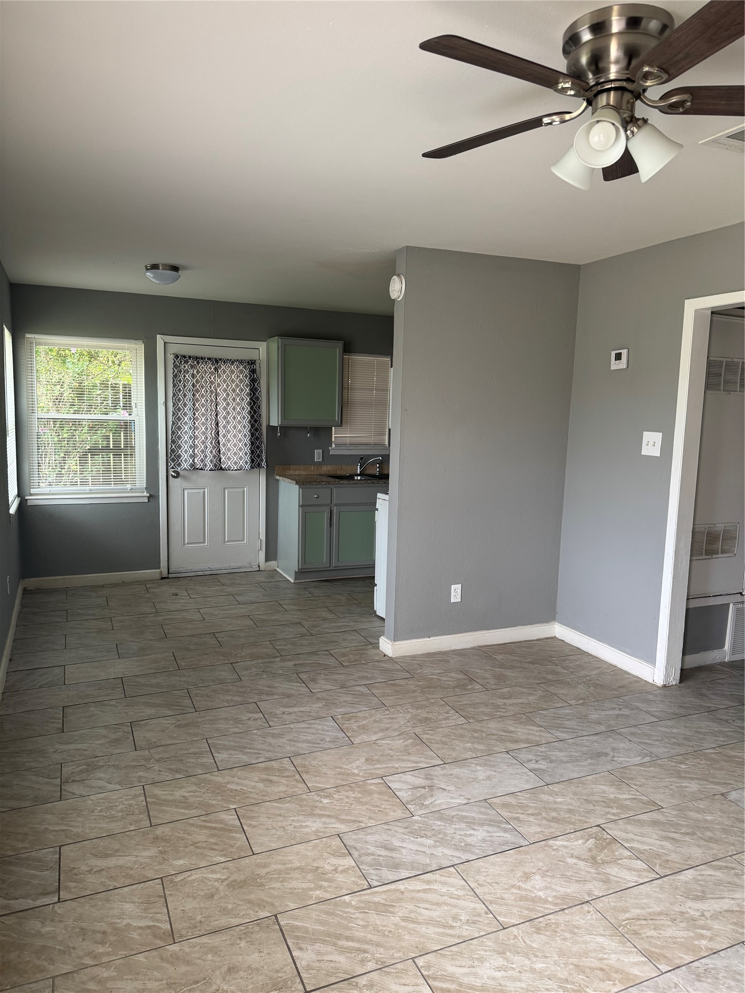 604 Wilson Road, Unit 8 Humble, TX 77338 - Photo 8 of 25 Open concept - Living room, breakfast area, and kitchen