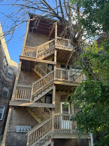 front view of a house with a small yard