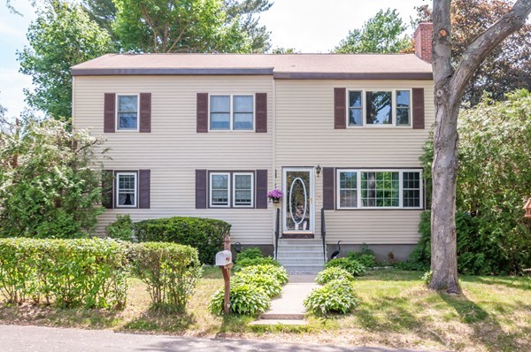 14 Carroll Road Woburn, MA 01801 - Photo 1 of 30 a front view of a house with a yard