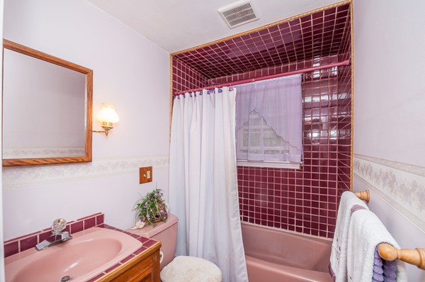 14 Carroll Road Woburn, MA 01801 - Photo 20 of 30 a bathroom with a sink and a bathtub