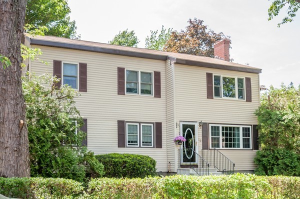 14 Carroll Road Woburn, MA 01801 - Photo 2 of 30 a front view of a house with an outdoor space