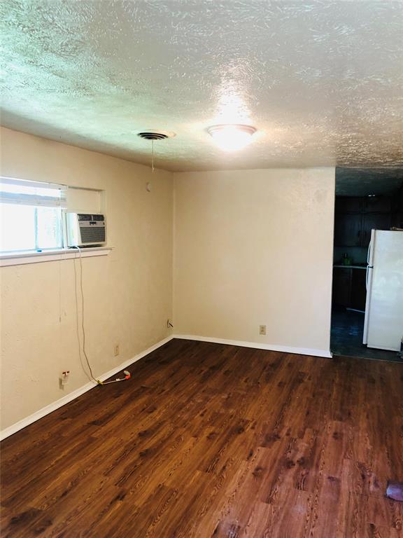 518 West Sycamore Street Denton, TX 76201 - Photo 4 of 11 wooden floor in a empty room