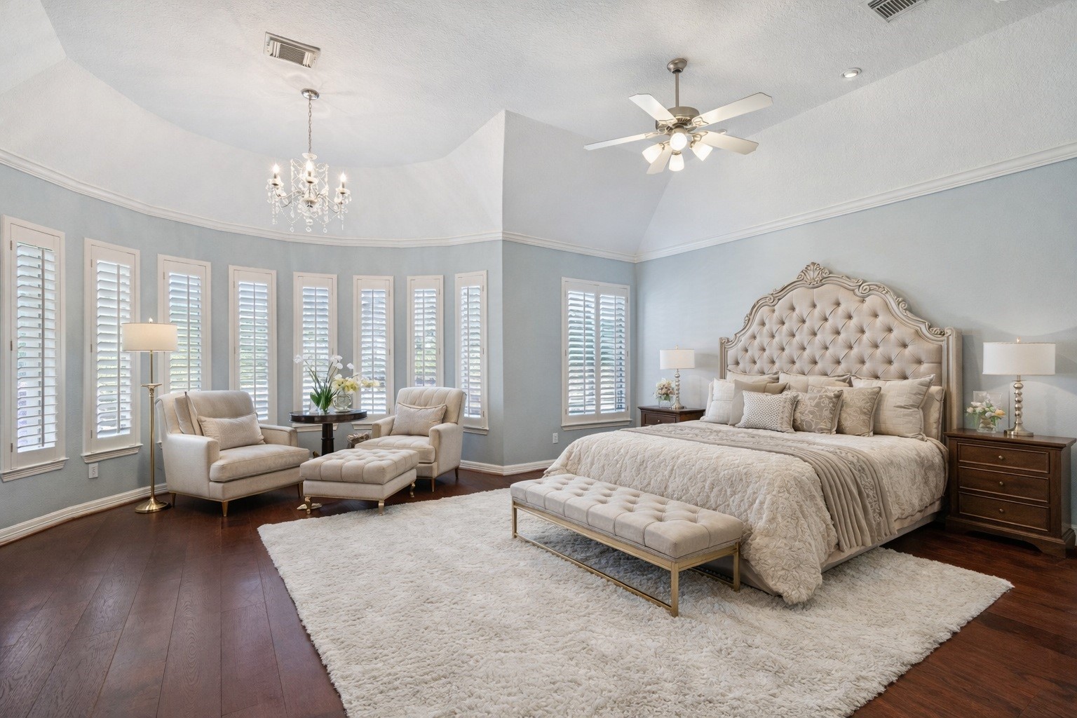 2202 Britton Ridge Drive Katy, TX 77494 - Photo 13 of 41 The primary bedroom offers a large layout with high ceilings, a sitting area, bay windows, and direct access to the primary bath and two walk-in closets, creating a comfortable and well-connected retreat. Virtually staged.