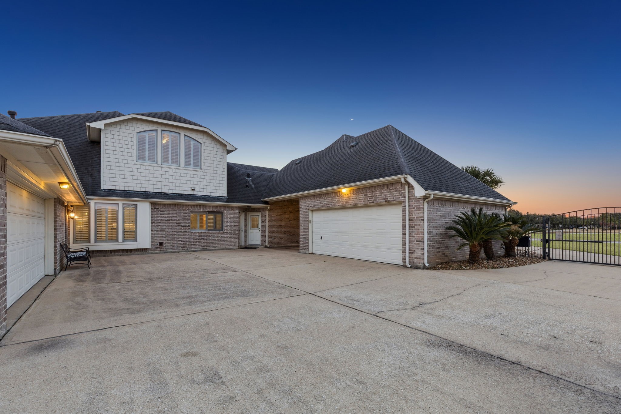 2202 Britton Ridge Drive Katy, TX 77494 - Photo 36 of 41 The property features two oversized garages, two separate drives with driveway gates with remote controls, and the flexibility to convert one garage bay into an apartment if desired.