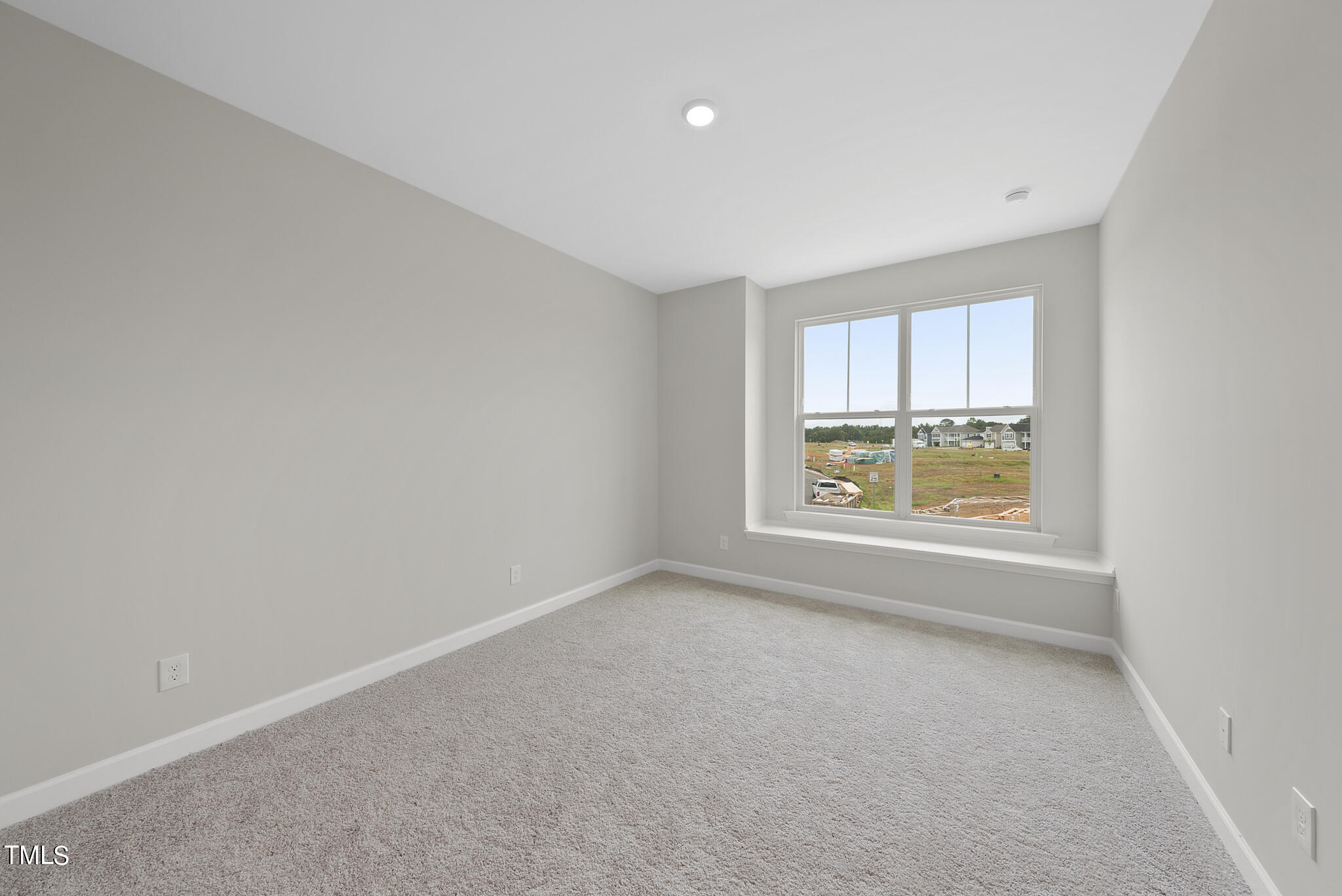 68 Ripple Way, Unit 309 Clayton, NC 27520 - Photo 16 of 39 Secondary bedroom with built-in
