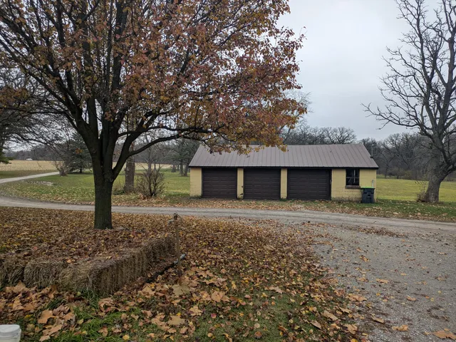 a house with trees in front of it