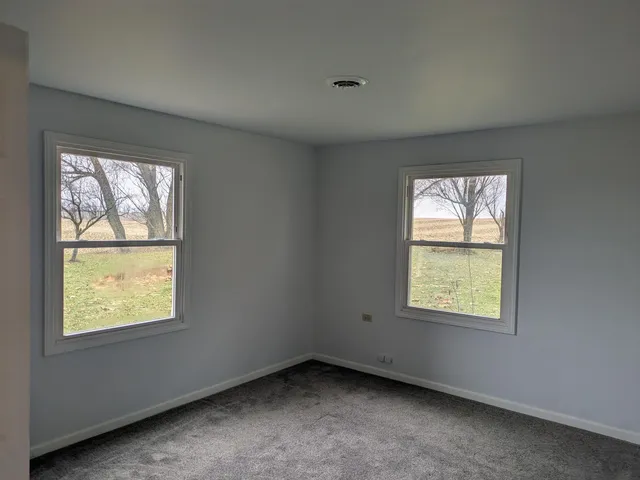an empty room with a window