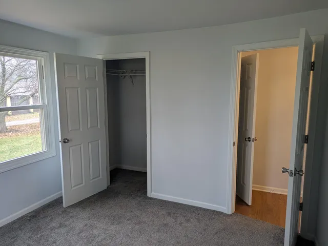 an empty room with windows