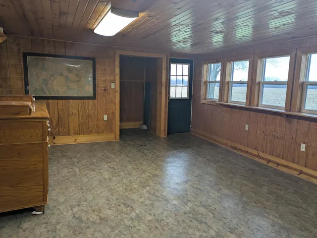 a view of a hallway with closet