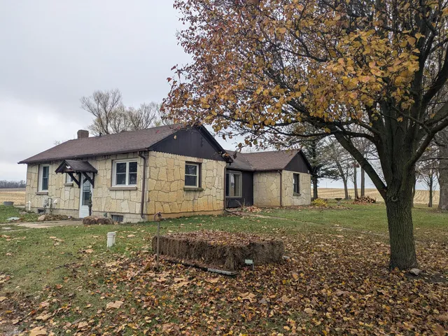 a view of a field with an trees