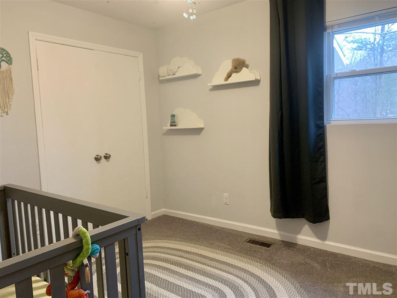 816 Patrick Road Bahama, NC 27503 - Photo 11 of 20 a view of a walk in closet