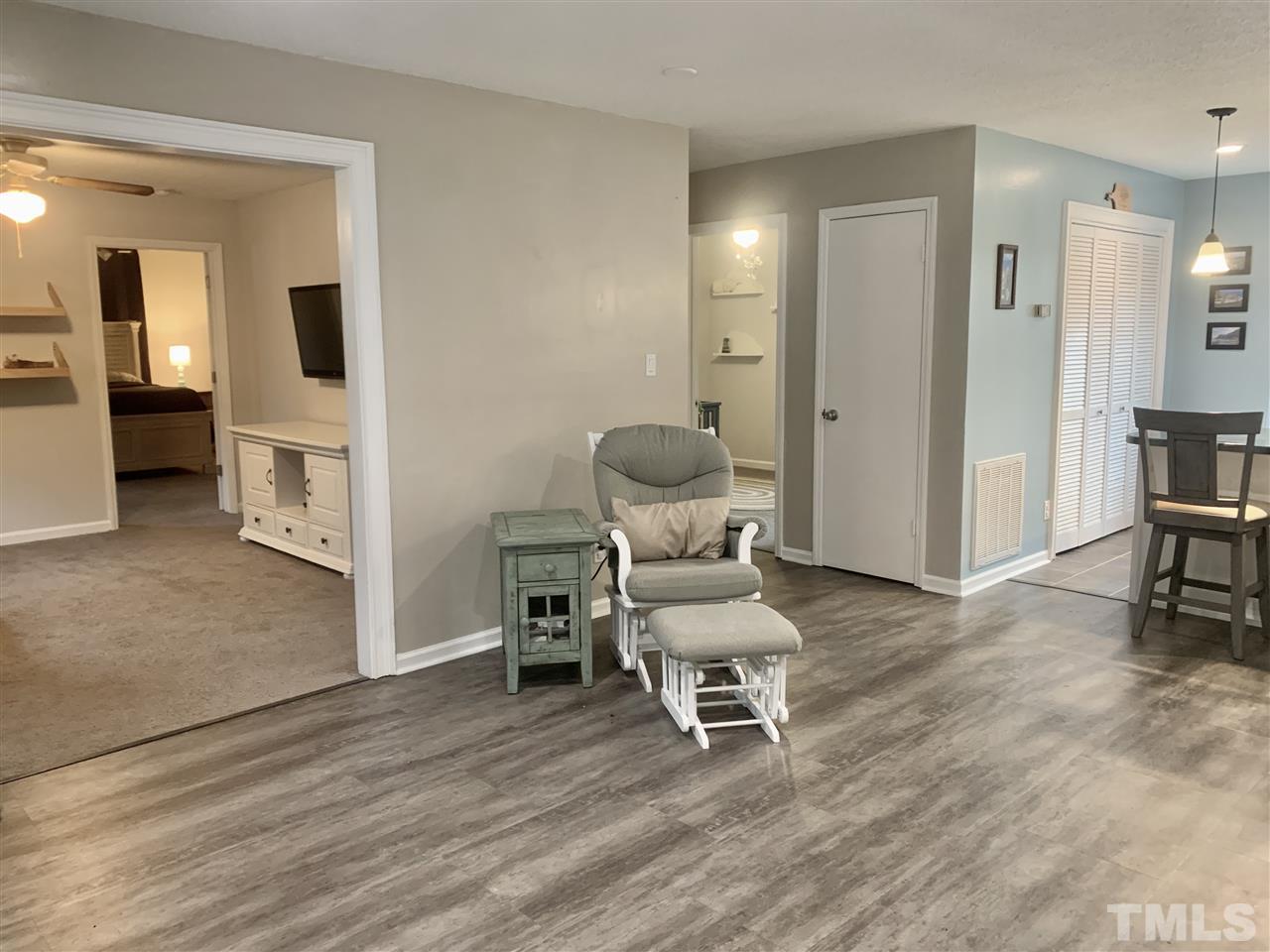 816 Patrick Road Bahama, NC 27503 - Photo 10 of 20 a living room with furniture and a wooden floor