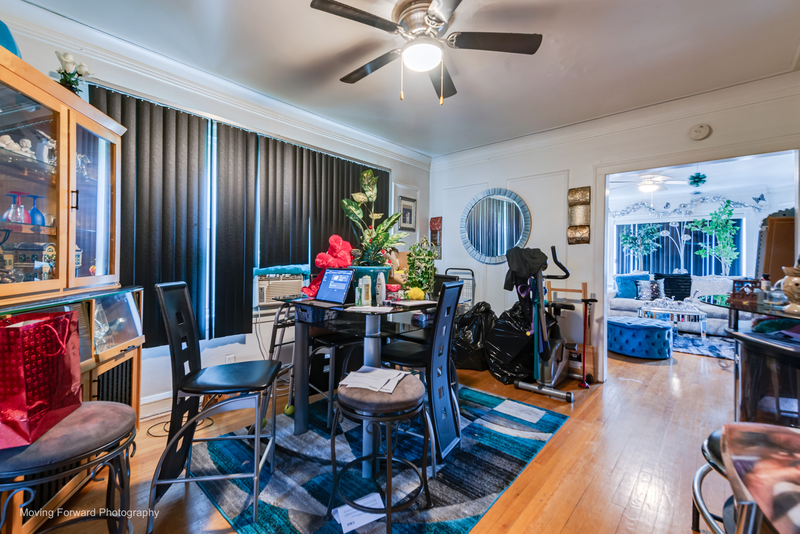 8213 South Indiana Avenue Chicago, IL 60619 - Photo 19 of 25 a view of a dining room with furniture and a window