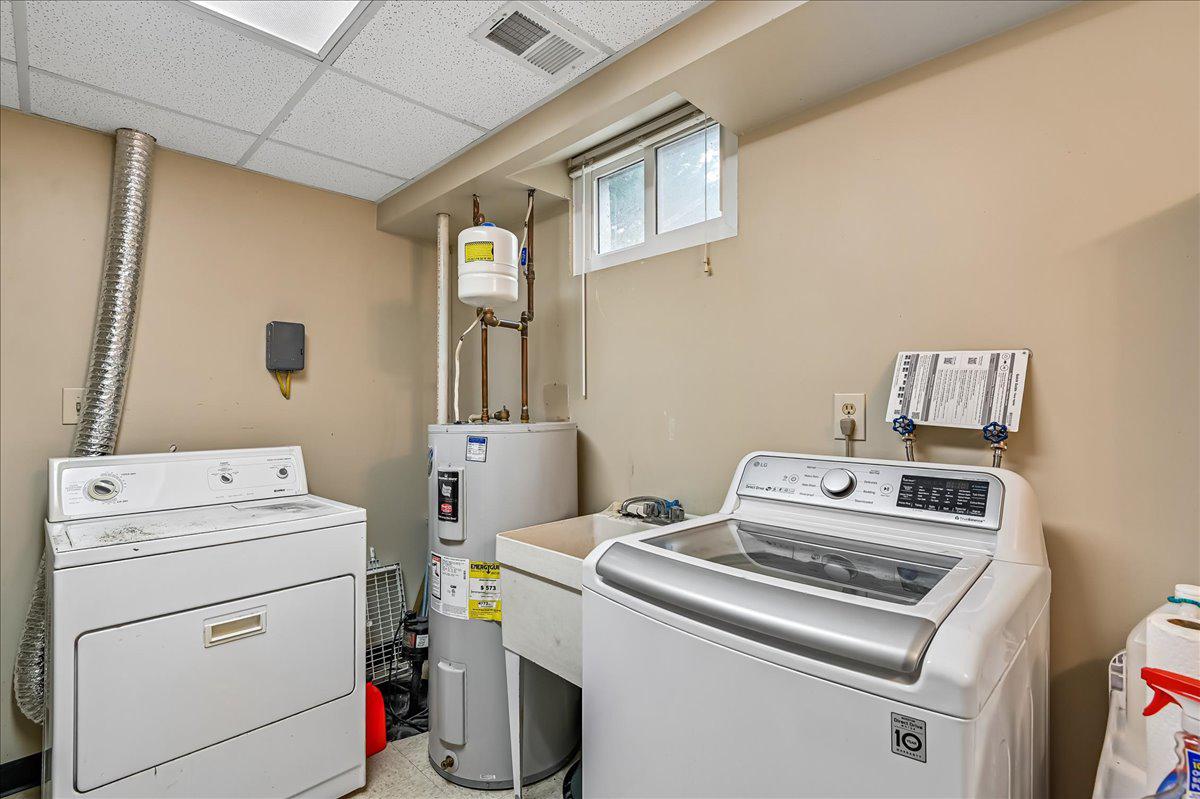 2894 Dungate Road Pasadena, MD 21122 - Photo 29 of 39 Functional basement laundry space.