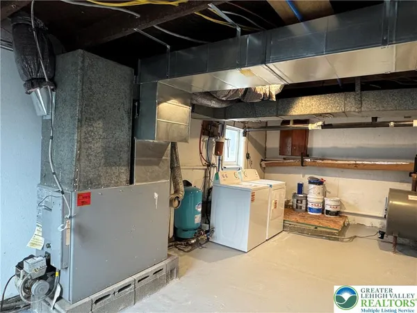 a utility room with cabinets