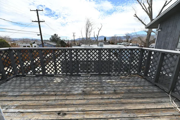 a view of a wooden fence