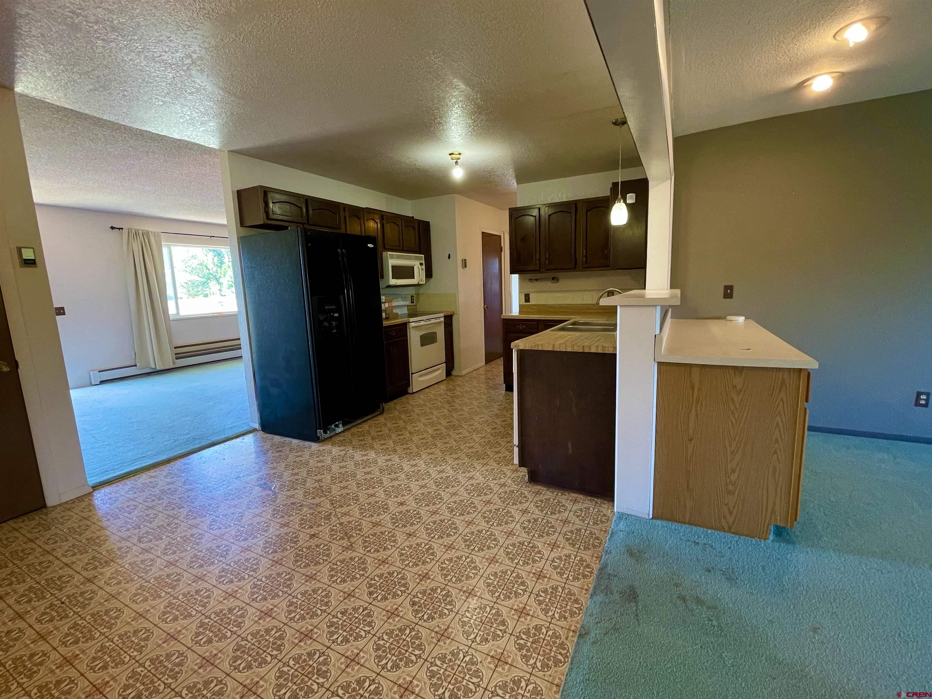 1733 B F Road Delta, CO 81416 - Photo 12 of 24 a view of a kitchen with a sink