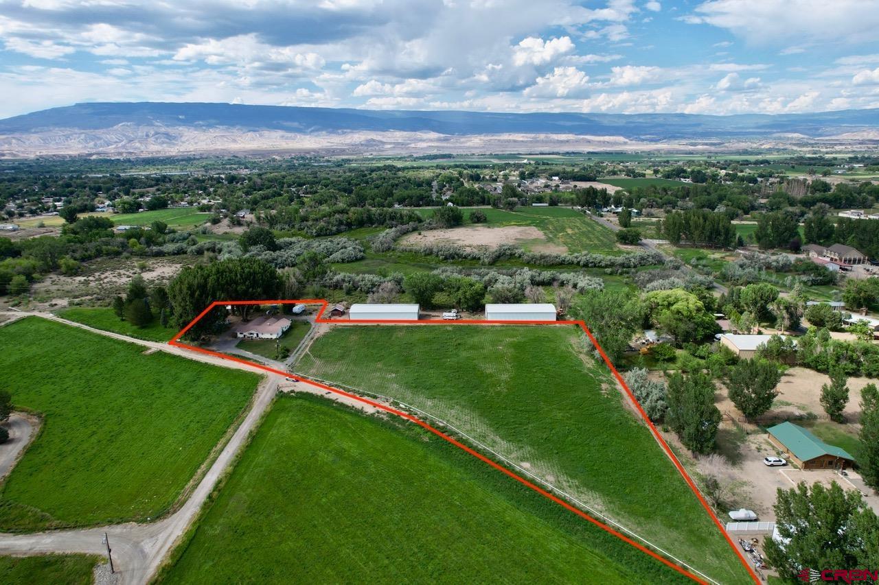 1733 B F Road Delta, CO 81416 - Photo 2 of 24 a view of a stadium that has a big yard