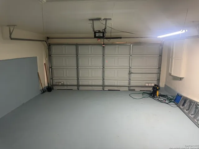 an empty room with an empty space and window