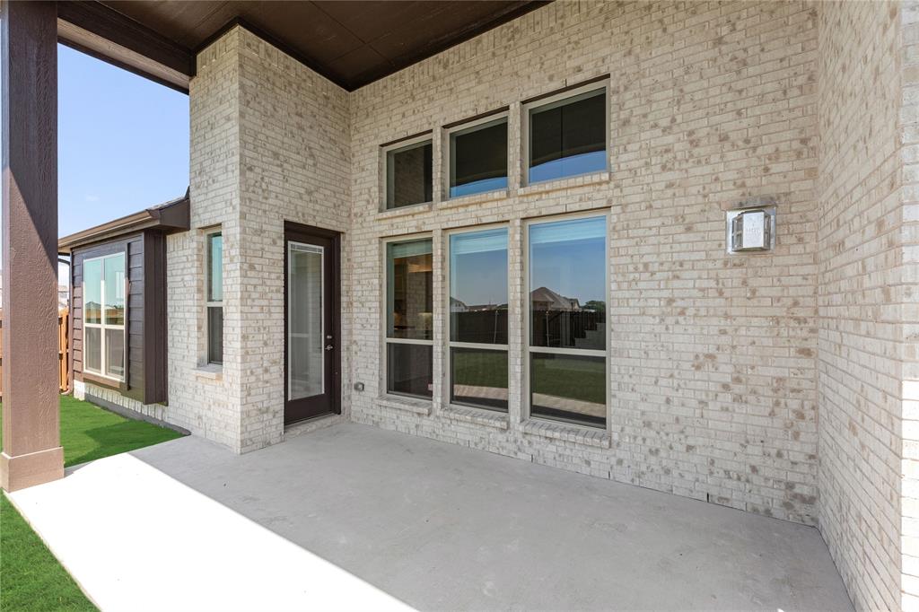 1145 Hitching Post Way Oak Point, TX 75068 - Photo 36 of 39 a view of front door of house