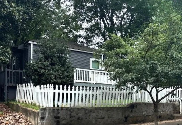 a front view of a house having yard