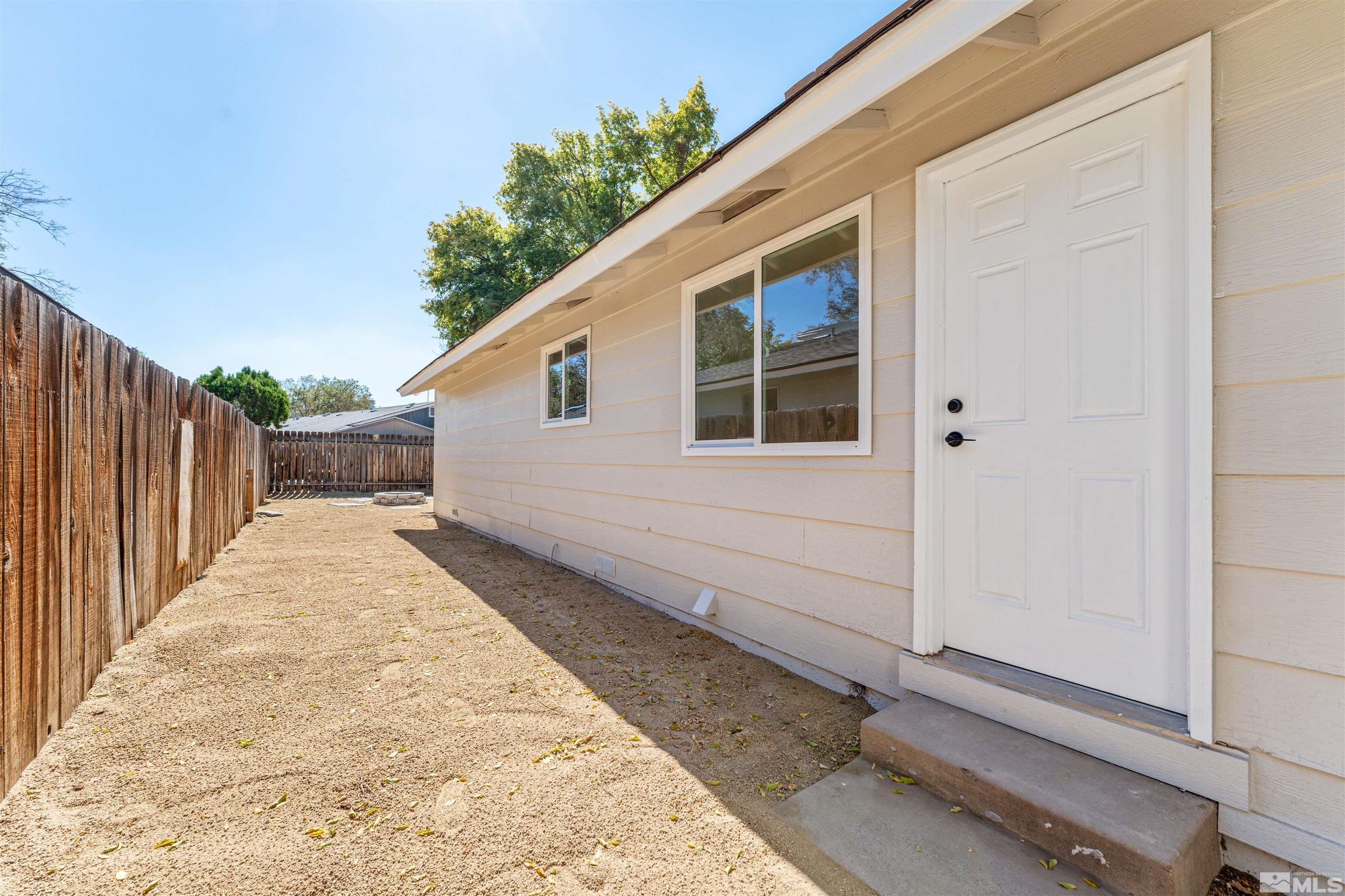 5280 Echo Avenue Reno, NV 89506 - Photo 25 of 31 a view of a house with a backyard