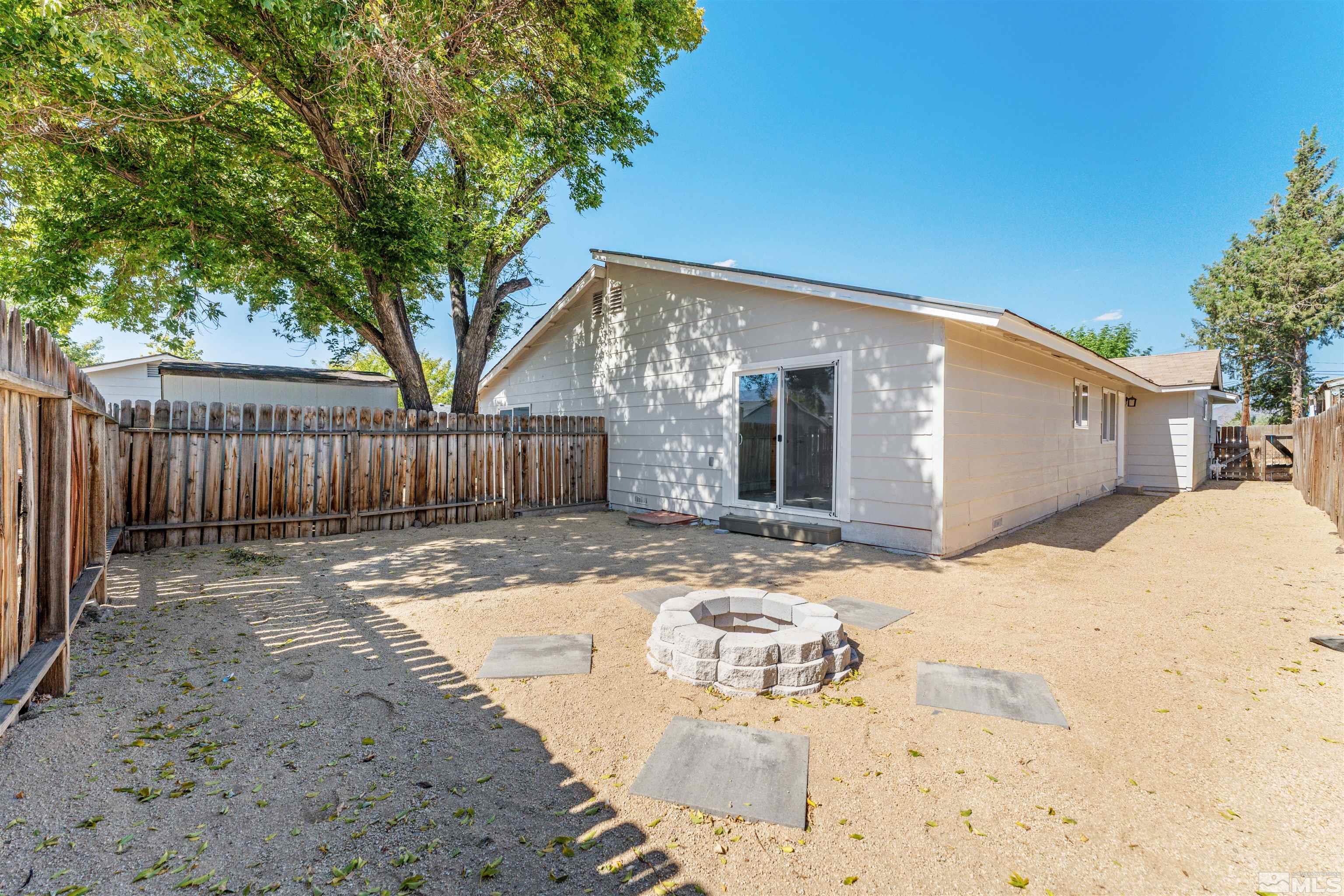 5280 Echo Avenue Reno, NV 89506 - Photo 26 of 31 a backyard of a house with wooden fence