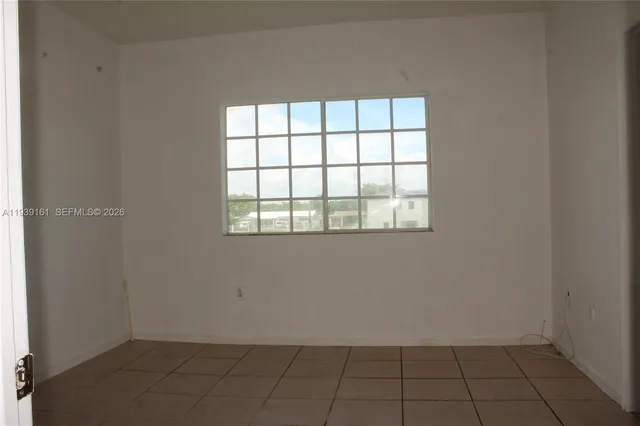 an empty room with a window