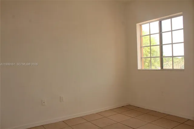 an empty room with a window