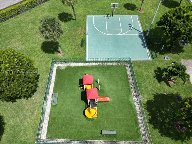 a view of a table and chairs in the garden