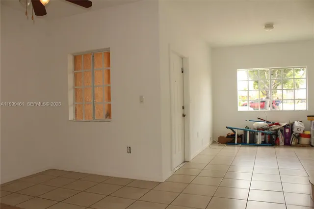 a kitchen with a cabinets and a stove top oven