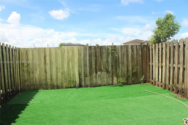 a room with furniture and window