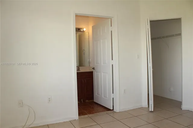a kitchen with stainless steel appliances a cabinets sink and microwave