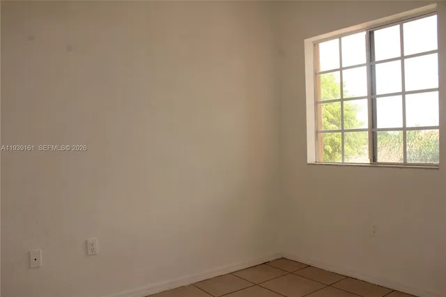 a room with furniture and window