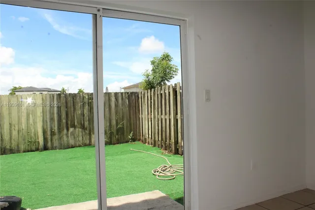 a view of a backyard with a garden