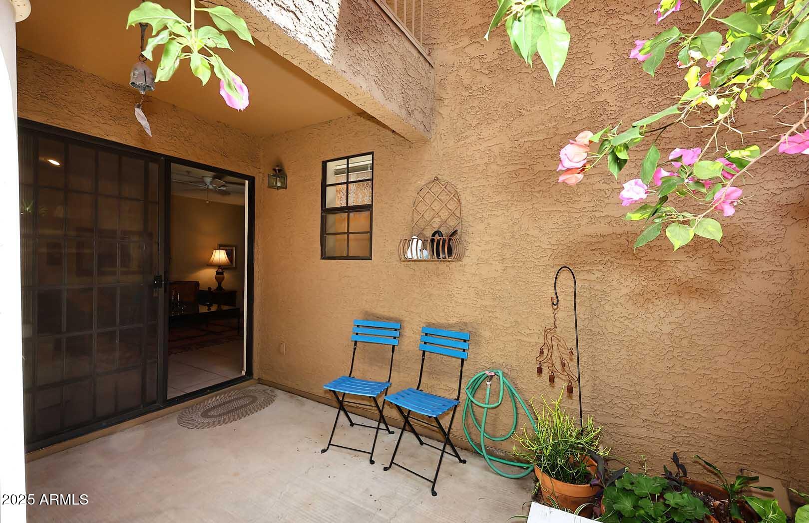 6945 East Cochise Road, Unit 117 Paradise Valley, AZ 85253 - Photo 26 of 39 a view of an entryway with wooden floor