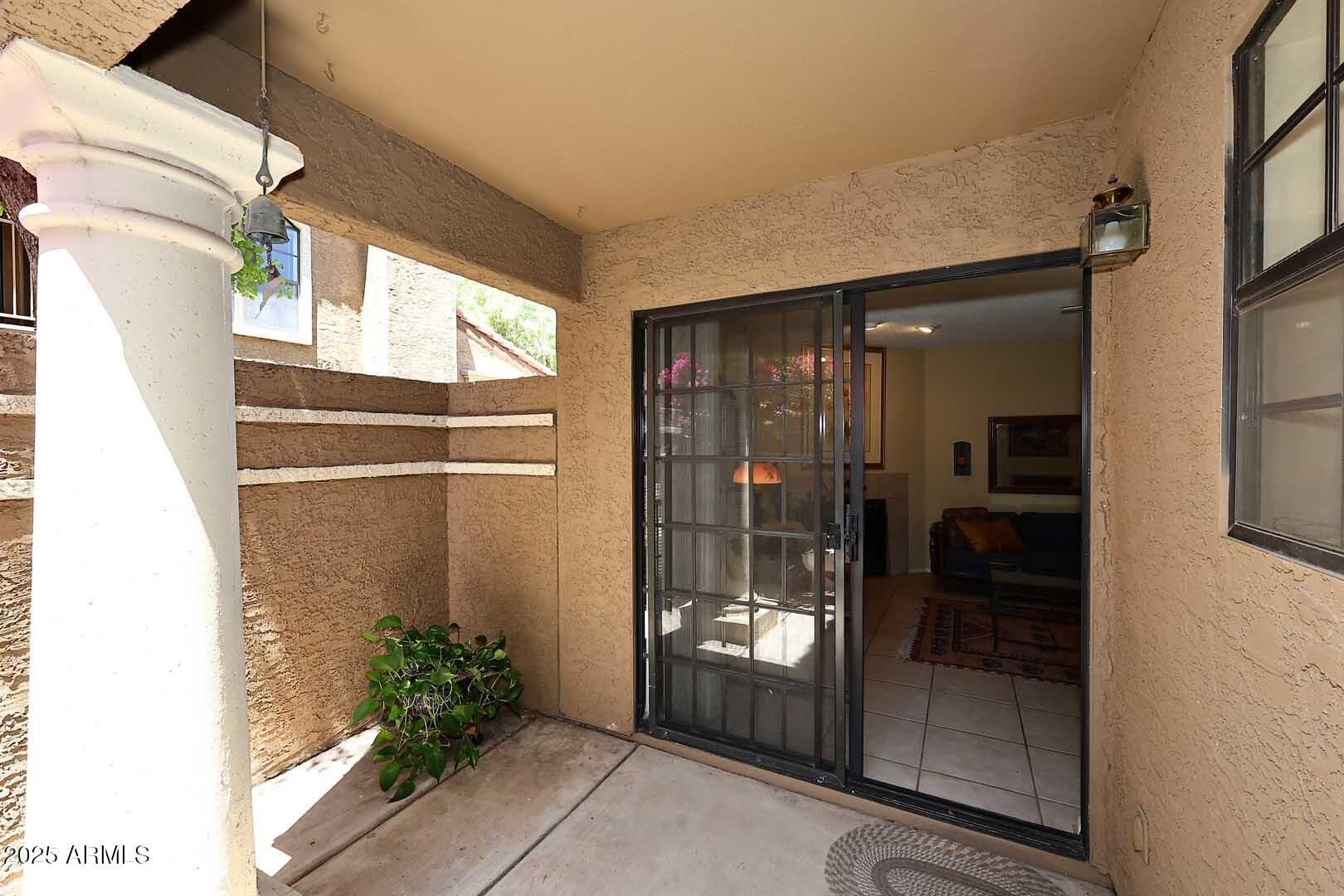 6945 East Cochise Road, Unit 117 Paradise Valley, AZ 85253 - Photo 27 of 39 a room with a glass door and shower