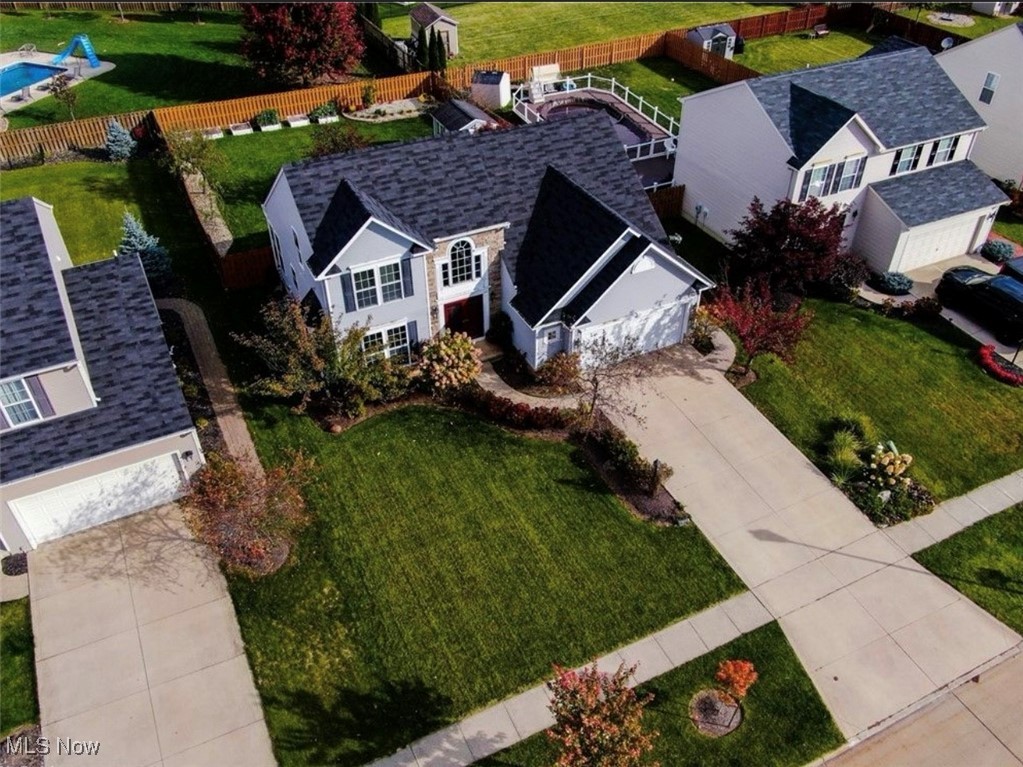 155 Stone Ridge Way Berea, OH 44017 - Photo 3 of 32 Aerial view of property and surrounding area featuring a pool