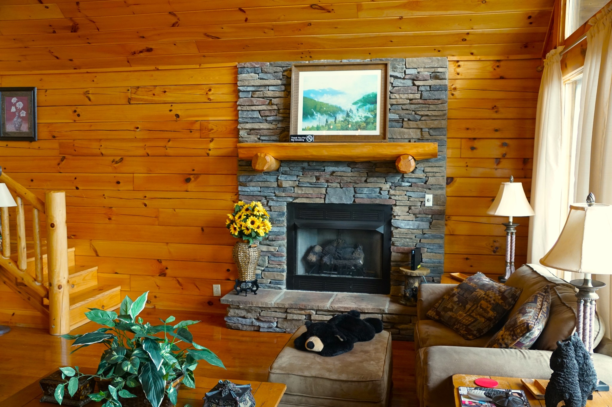 1724 Bluff Ridge Road Sevierville, TN 37876 - Photo 13 of 29 a living room with furniture and a fireplace