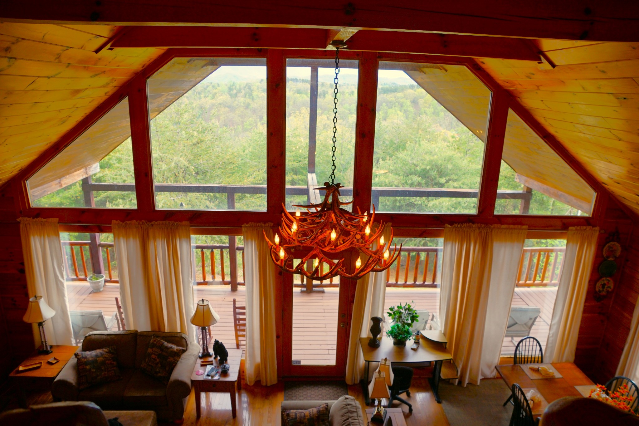 1724 Bluff Ridge Road Sevierville, TN 37876 - Photo 14 of 29 a living room filled with furniture and a window
