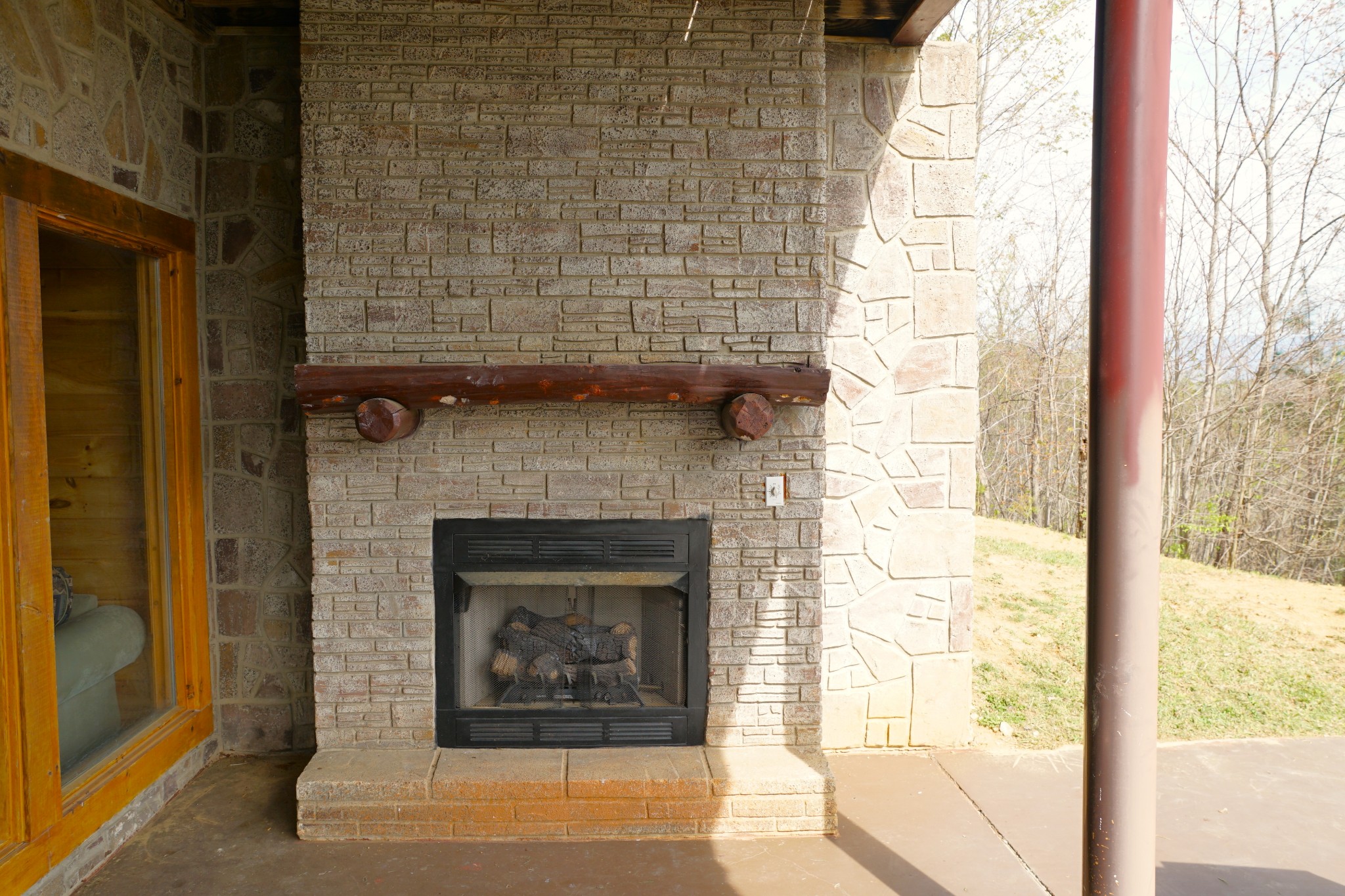 1724 Bluff Ridge Road Sevierville, TN 37876 - Photo 19 of 29 a living room with a fireplace